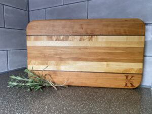 Handcrafted wooden cutting board with custom engraving – premium hardwood kitchen board, perfect for serving, chopping, and gifting. Custom orders available.