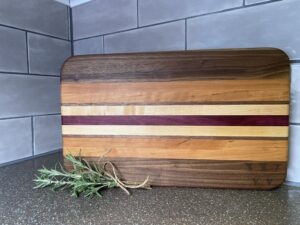 Handcrafted wooden cutting board with custom engraving – premium hardwood kitchen board, perfect for serving, chopping, and gifting. Custom orders available.